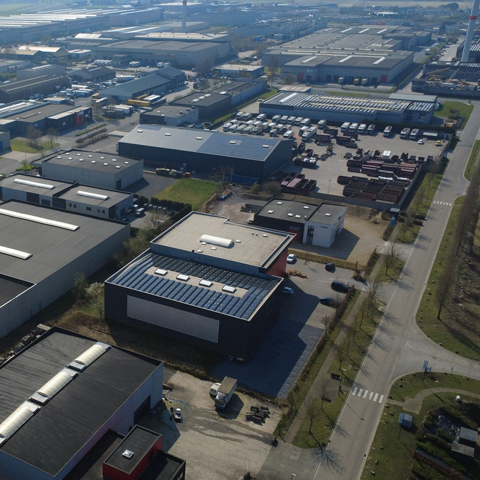Évaluation immobilière bâtiment industriel zoning Tournai